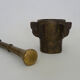 Old apothecary mortar with fins and its bronze pestle