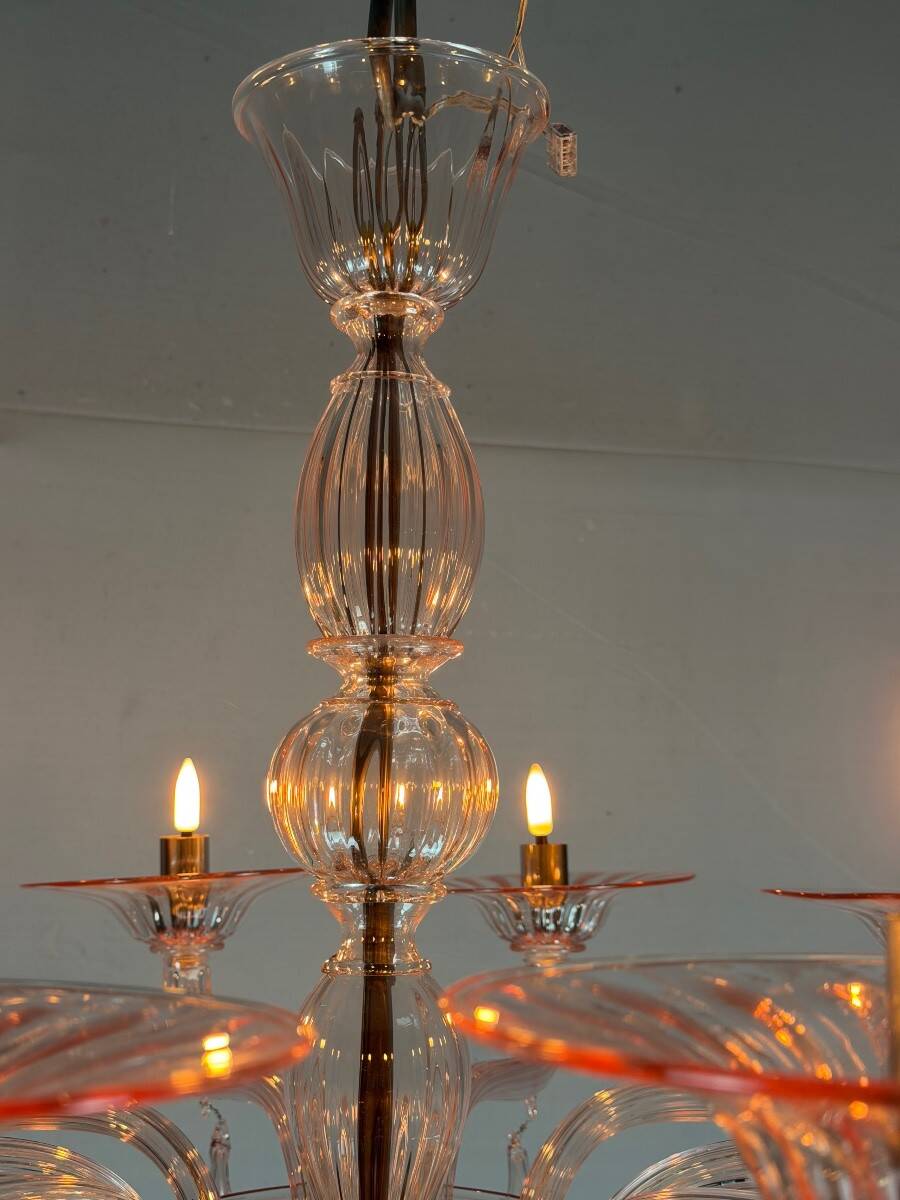 Venetian glass lustre in pink, in the style of Venini.