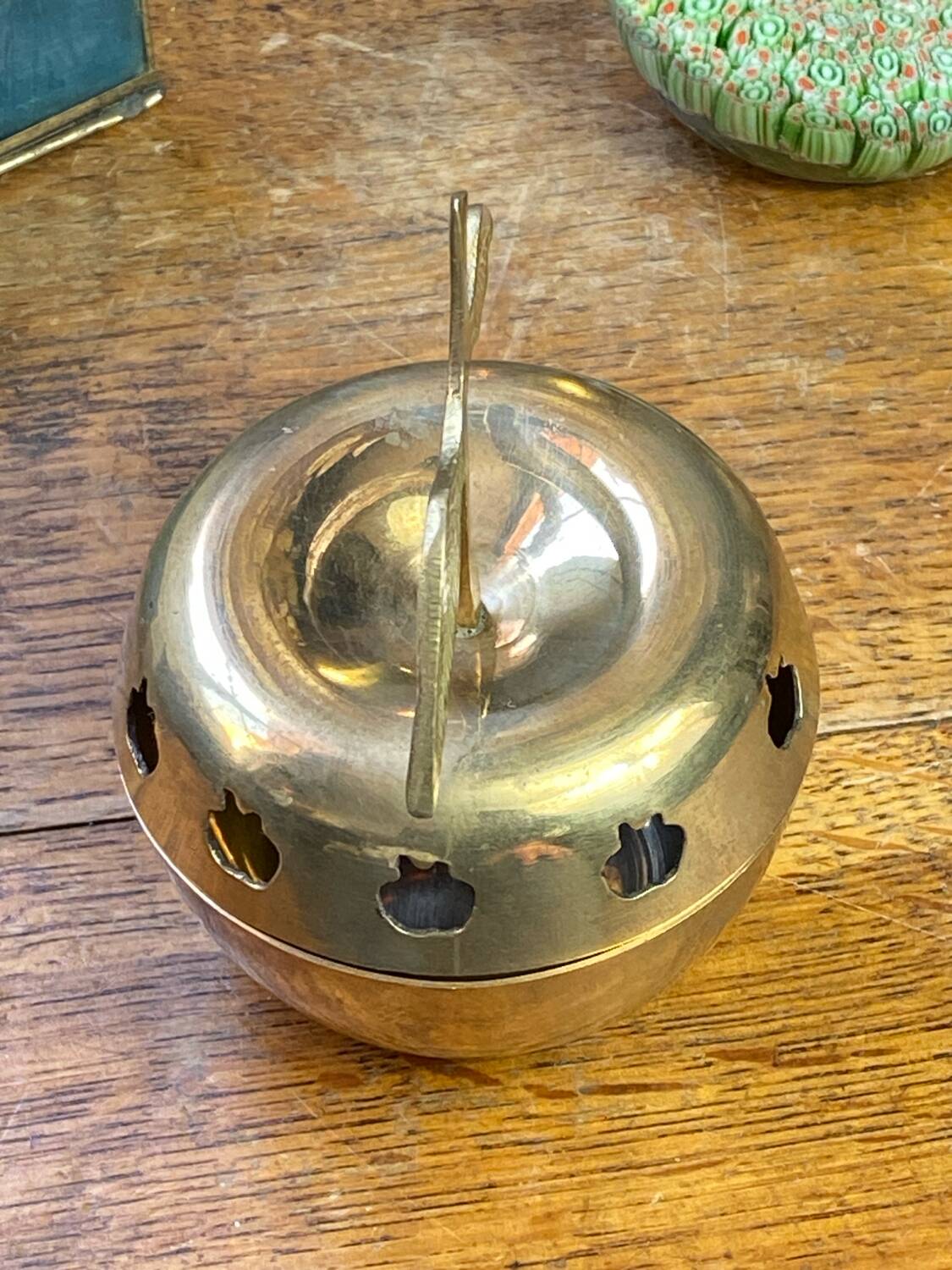 Bonbonnière, in the shape of an apple, made of brass.