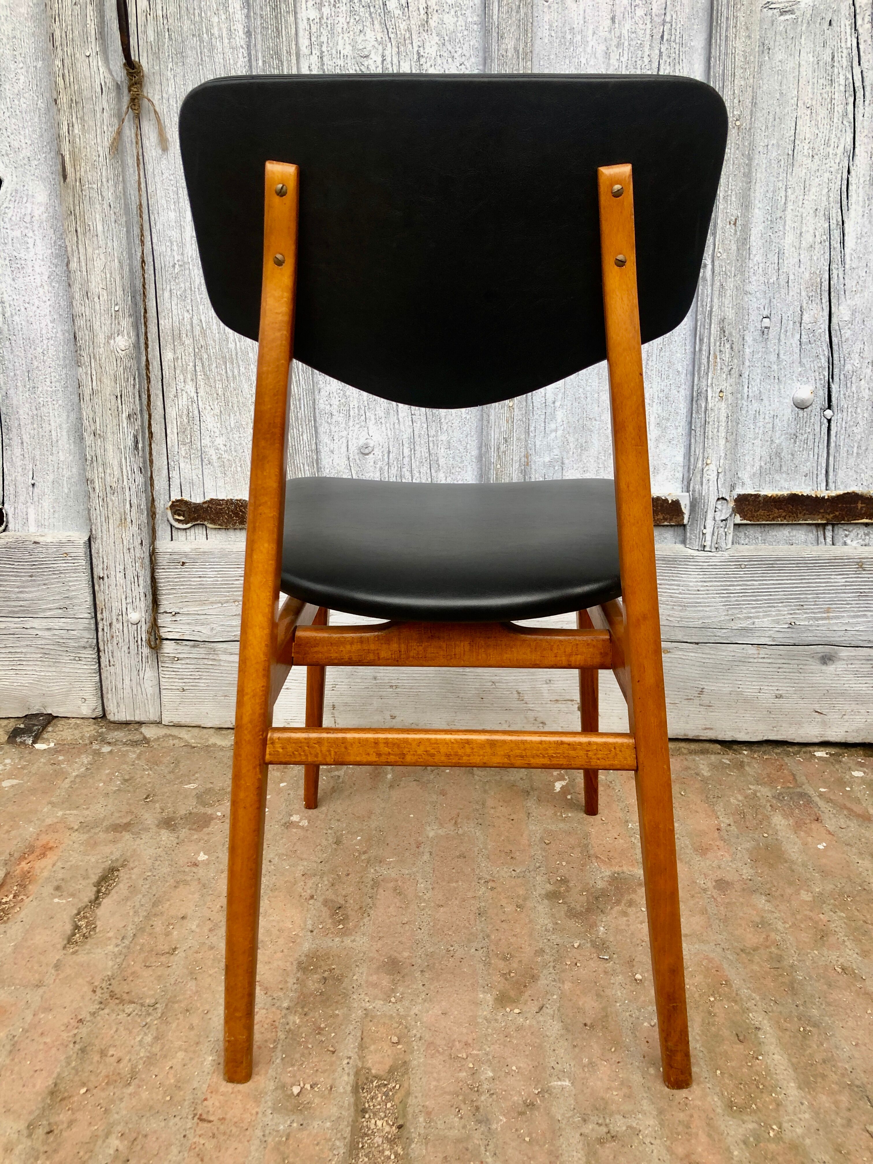 Set of 4 Scandinavian teak and black skai chairs