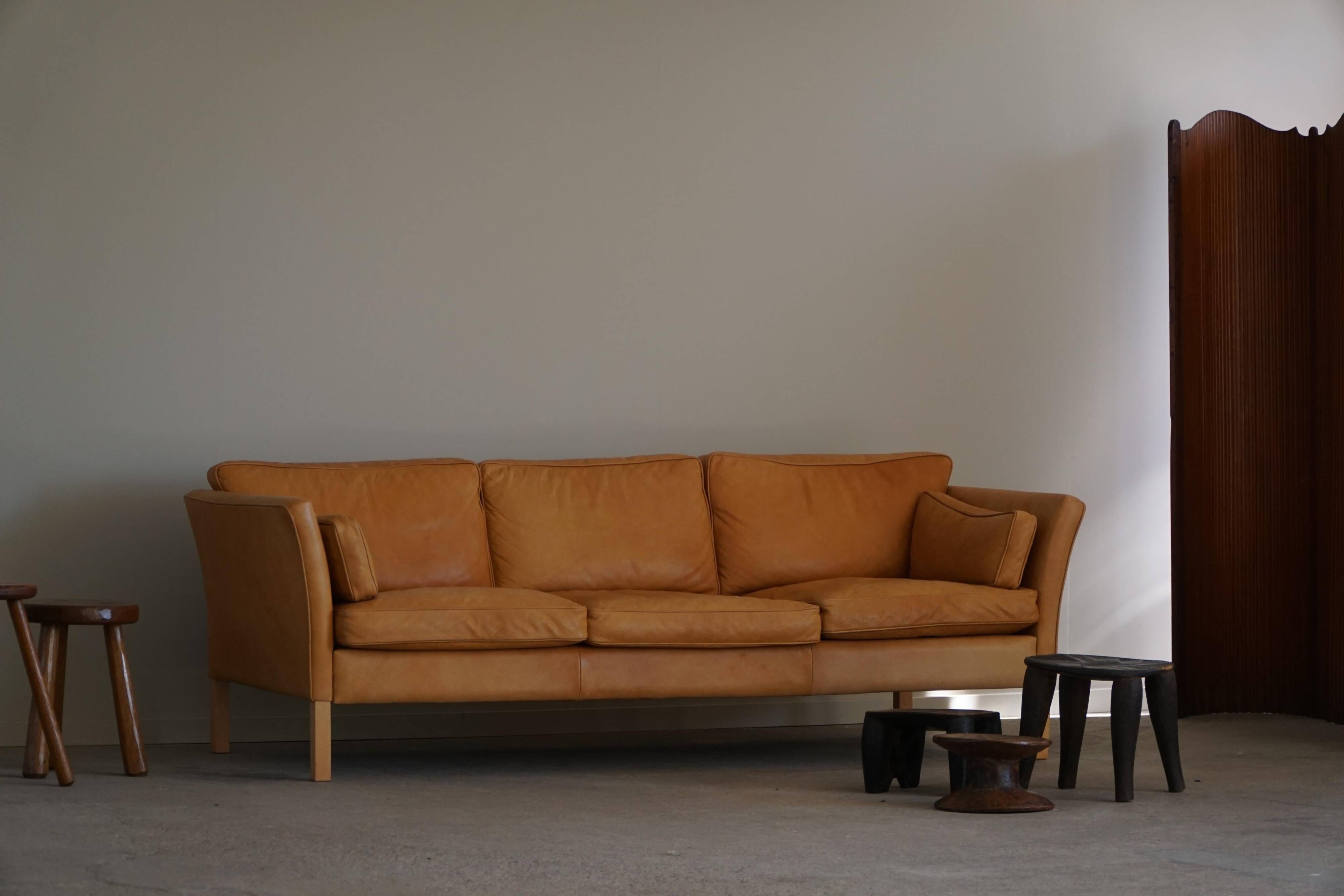 Danish Midcentury 3-seater canapé by Stouby in cognac brown leather, made in the 1970s.