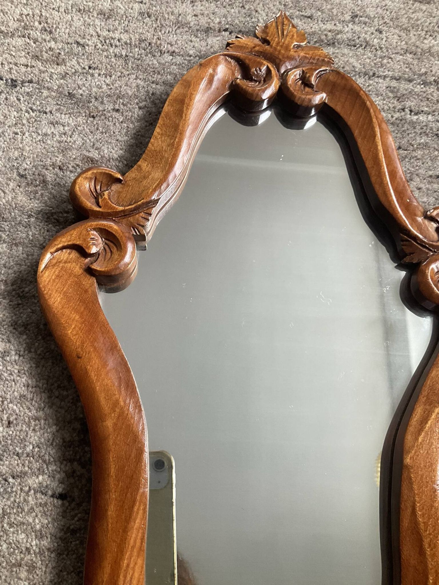 Miroir vintage en bois sculpté