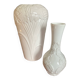 A pair of vintage vases in glazed porcelain.