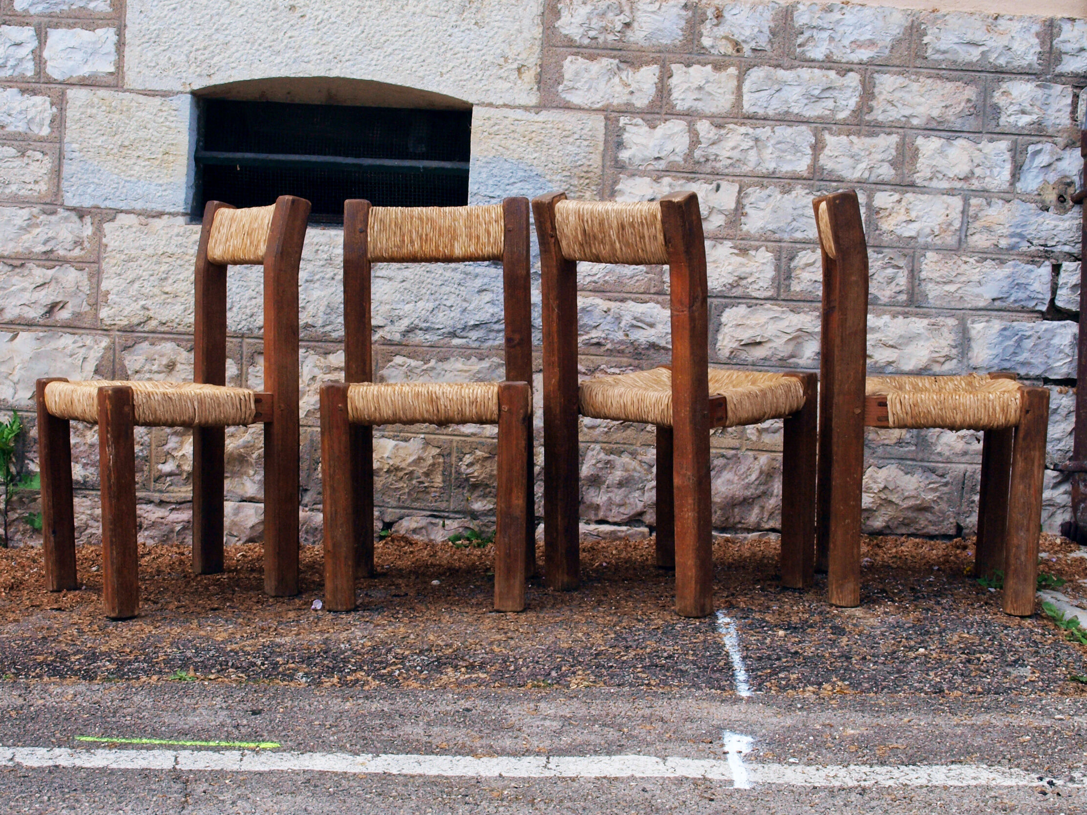 Brutalist chairs in pine and straw, France, 1950s, set of 4