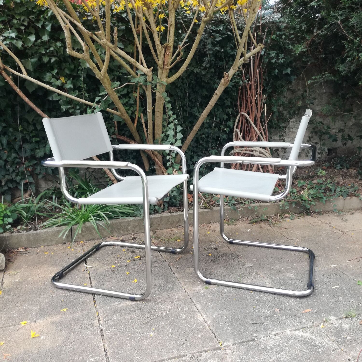 Pair of cantilever armchairs in grey leather made in italy