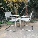 Pair of cantilever armchairs in grey leather made in italy