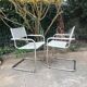Pair of cantilever armchairs in grey leather made in italy