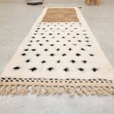 Moroccan polka dot hallway, white and brown beni ourain rug, berber design