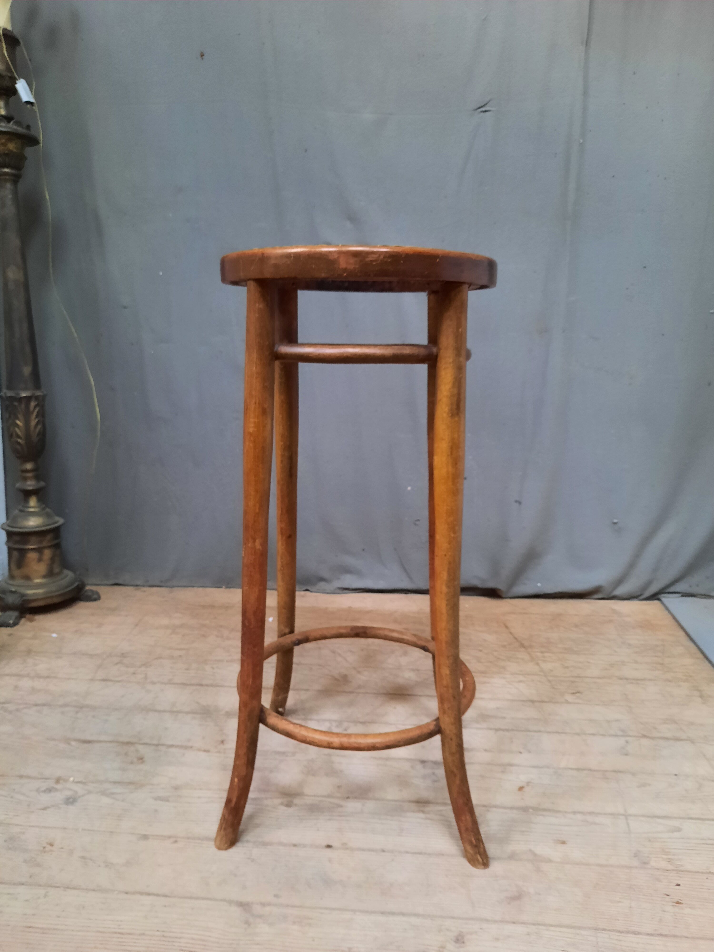 High bent wooden stool