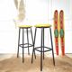 Pair of black metal bar stools and yellow imitation leather seat