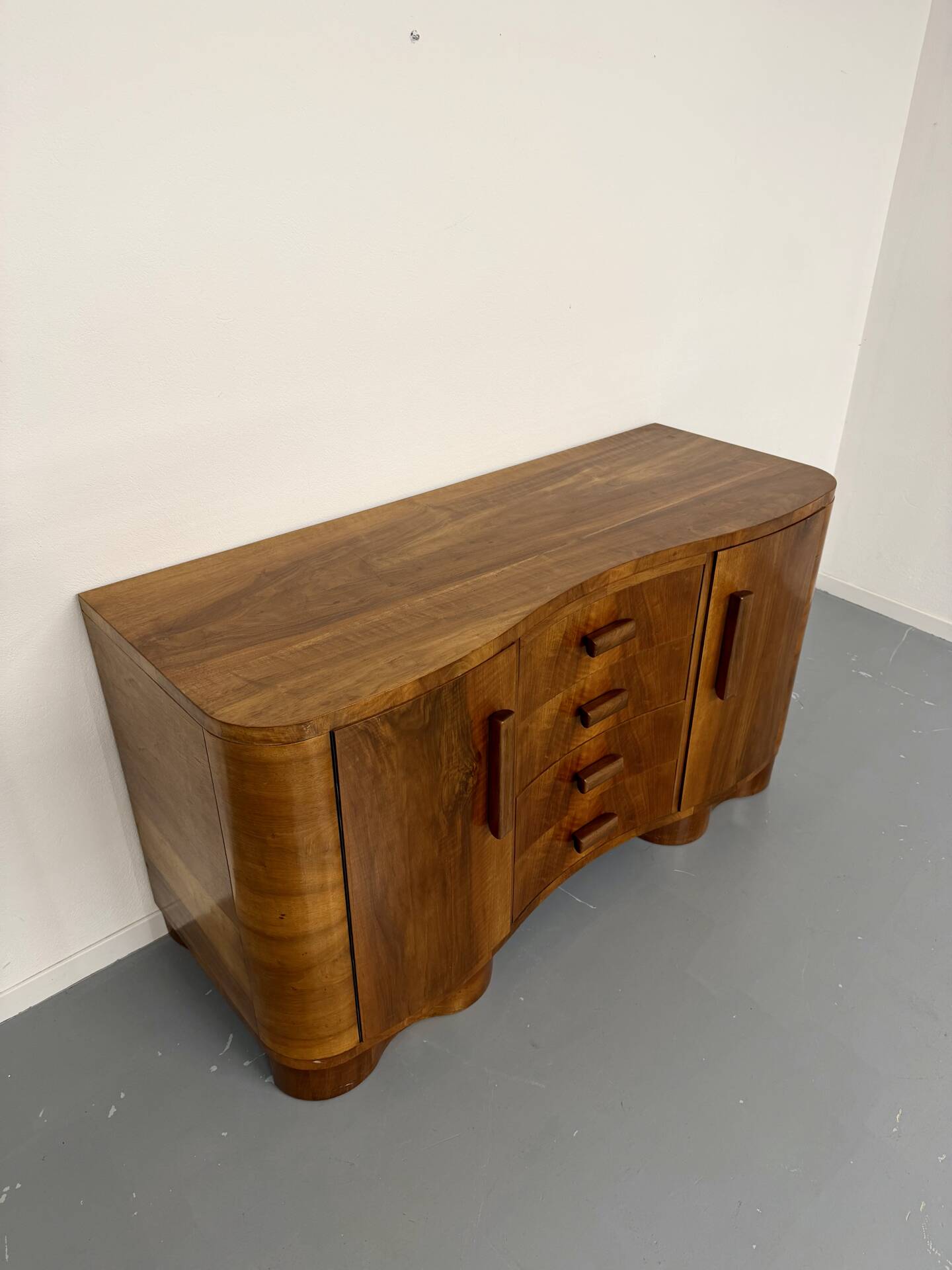 Antique walnut sideboard in Art Deco style from the 1930s.