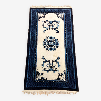 Tapis bleu motifs ethniques - 171 x 90 cm