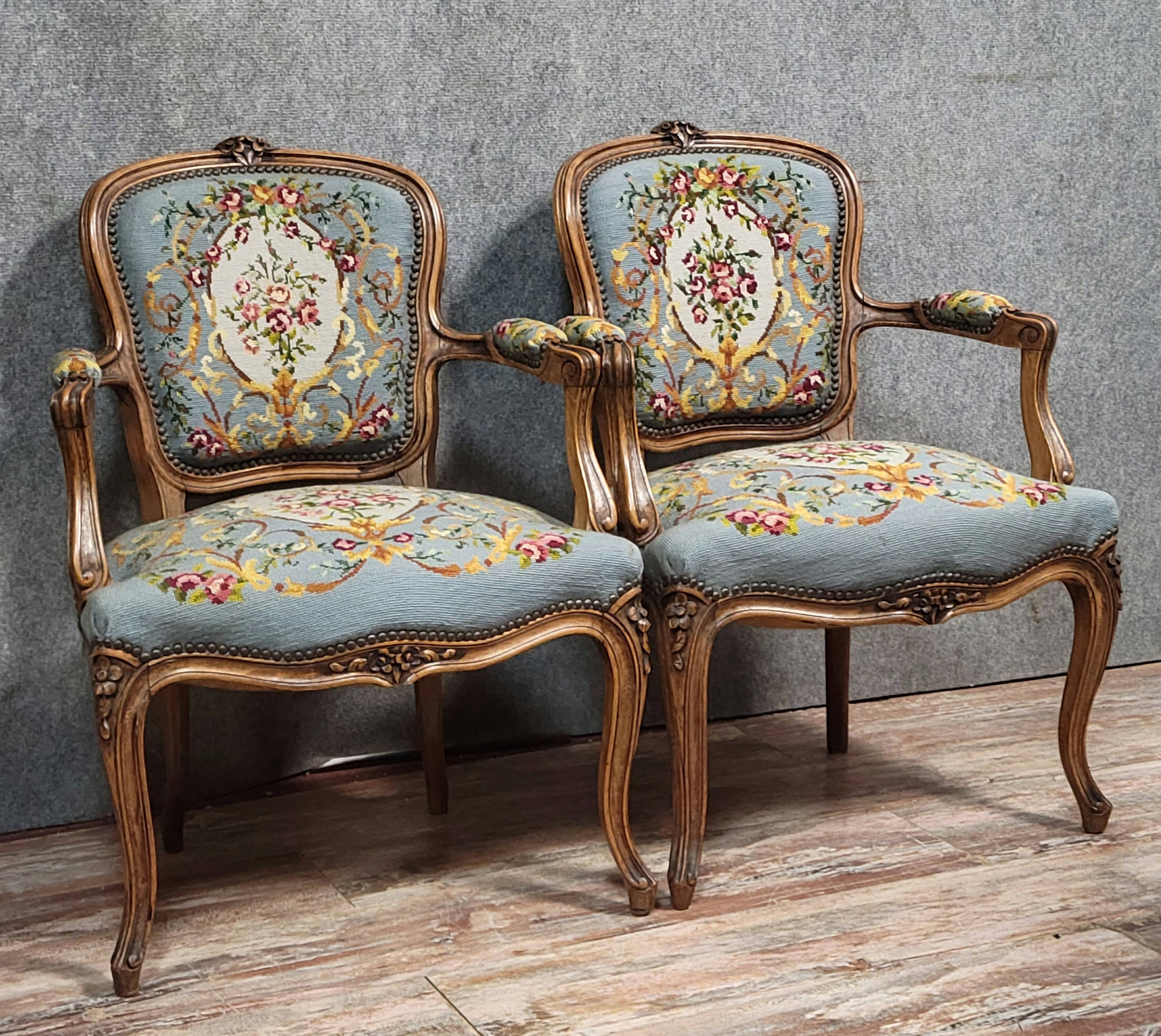 Pair of Louis XV style cabriolet armchairs in walnut