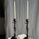 Two large antique silver-plated metal candlesticks, H30