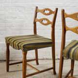 Set of four oak and wool dining room chairs by Henning Kjaernulf, 1960's