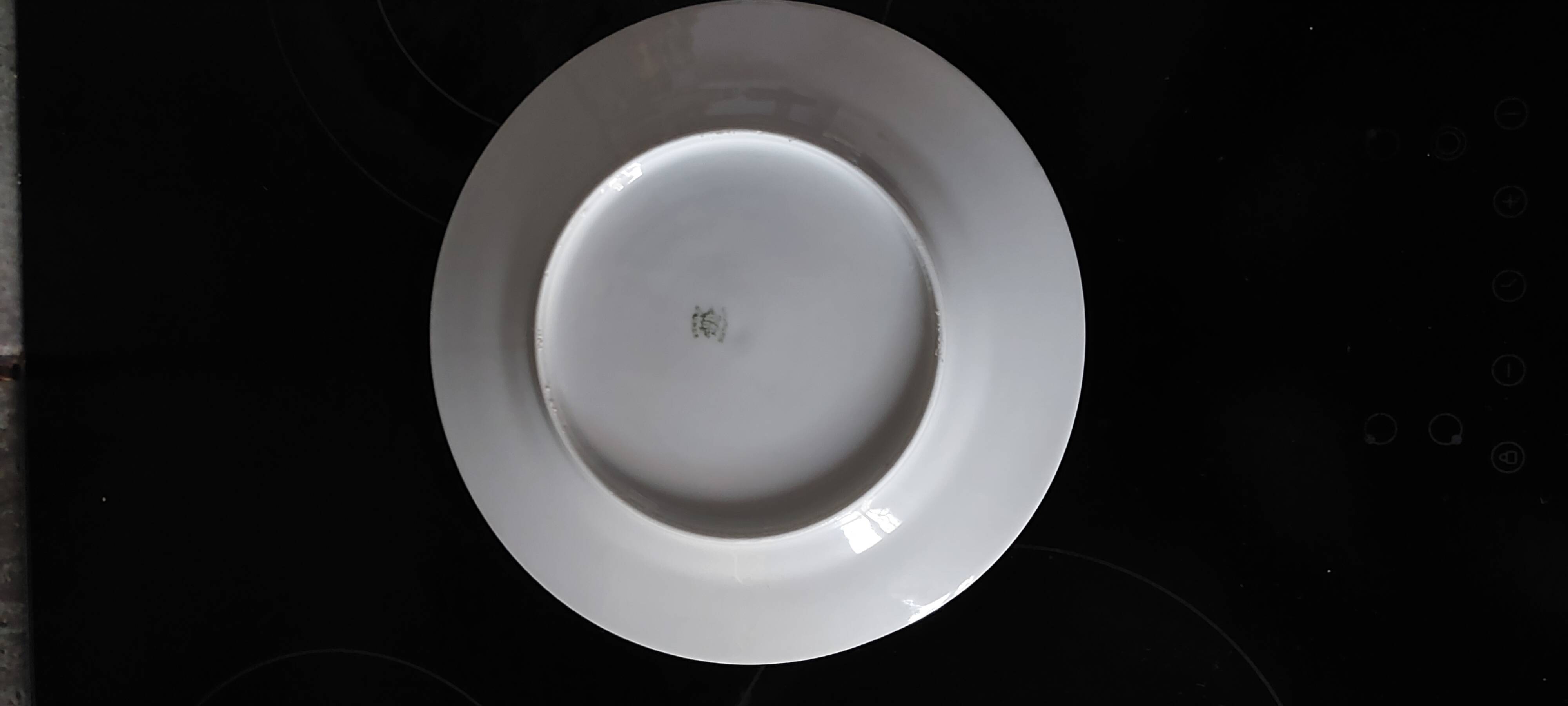 White and gold Limoges plates