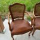 Cane and leather armchair in Louis XV style
