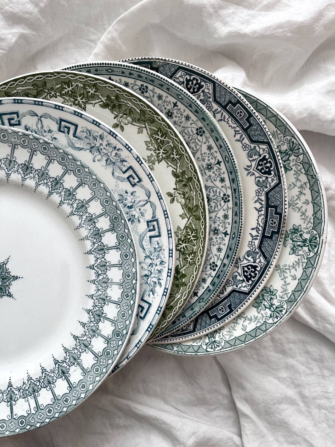 6 mismatched Saint Amand ironstone flat plates