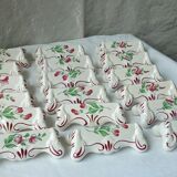 Suite of 18 knife holders in faience of luneville model reverbere