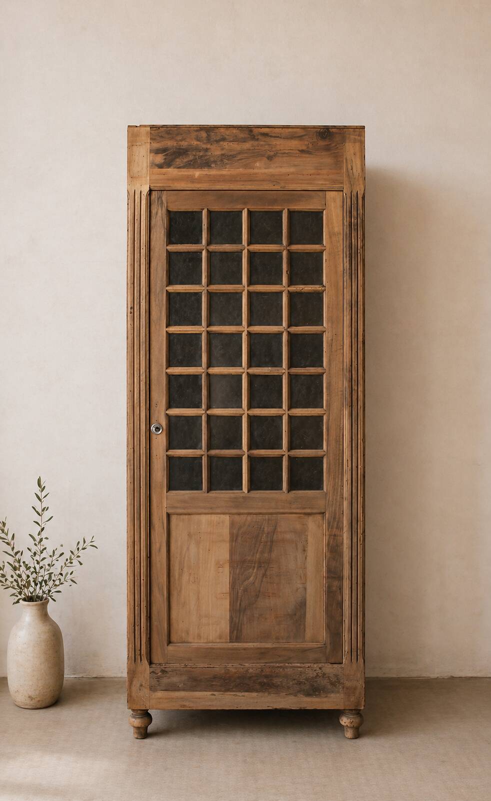 Glass-fronted cabinet from 1915, solid wood.