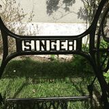 Cast iron and solid wood side table