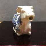 English porcelain cow-shaped sauce dish