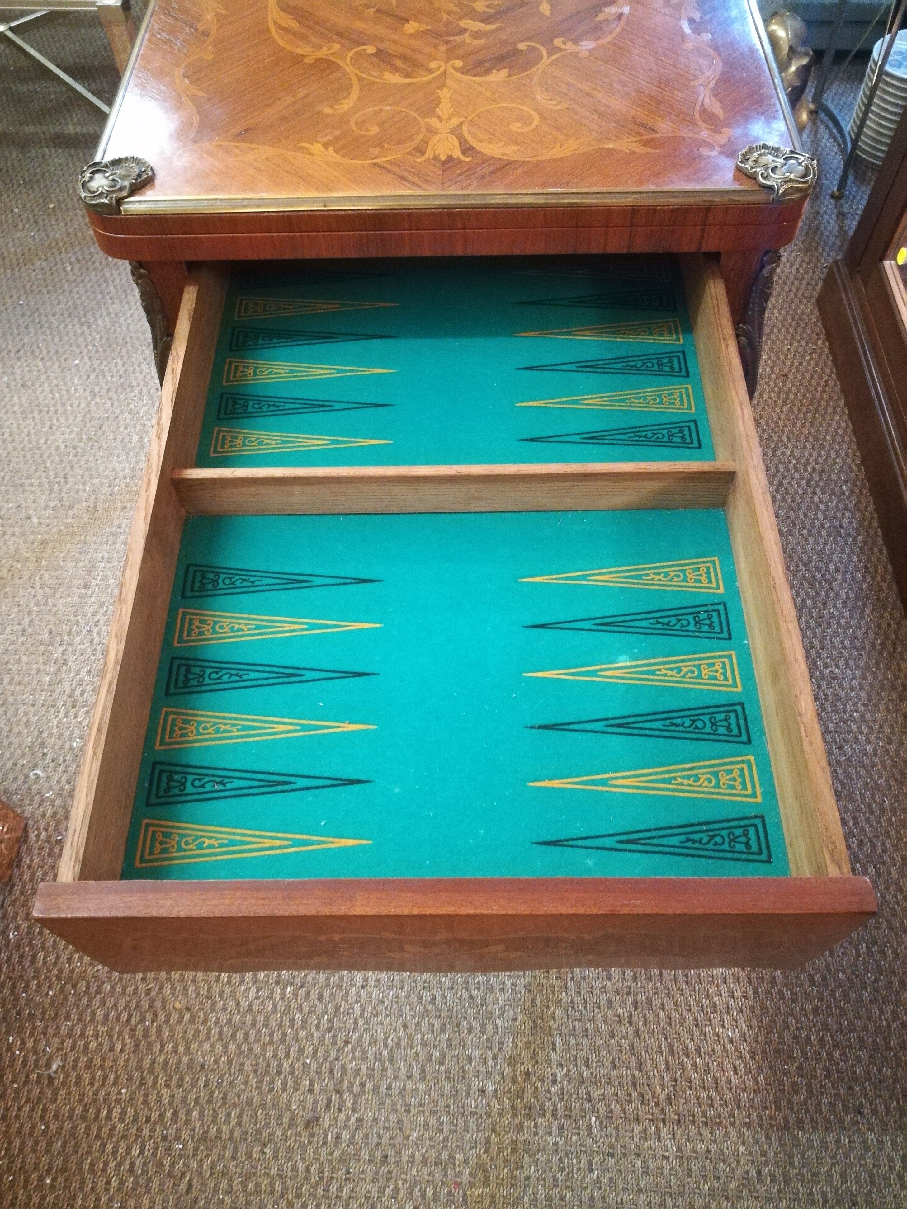 Louis XV style game table in marquetry