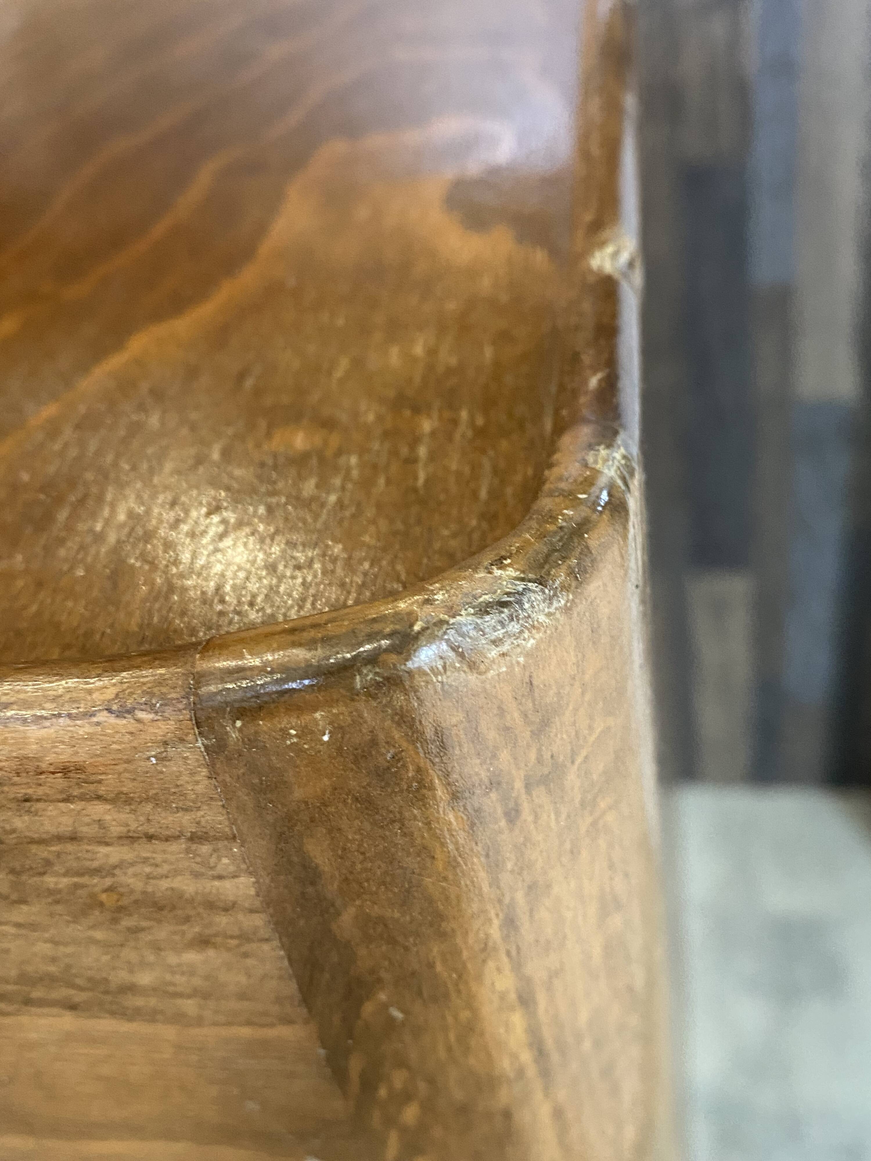 A bedside table with a drawer and a niche in Louis XV style.