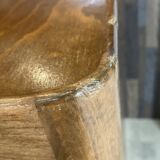 A bedside table with a drawer and a niche in Louis XV style.