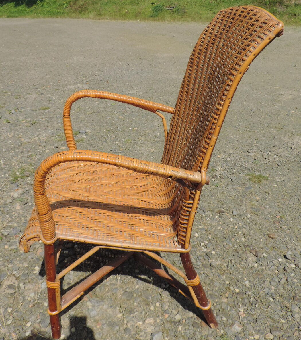 Rattan armchair with high backrest
