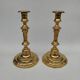 Pair of solid brass candlesticks, early 18th century.