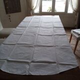 Antique white tablecloth embroidered with flowers and matching napkins
