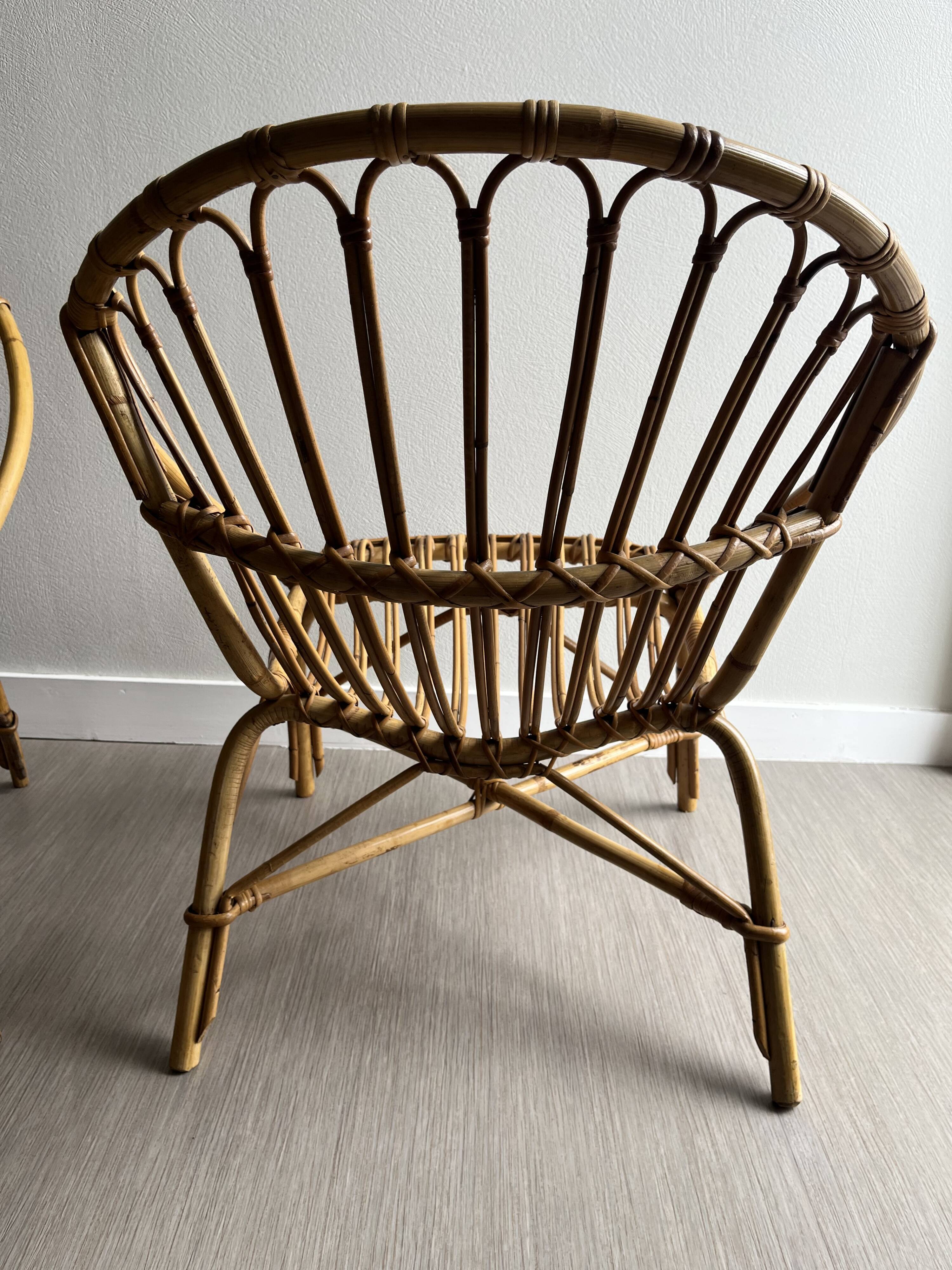 Vintage rattan shell armchairs
