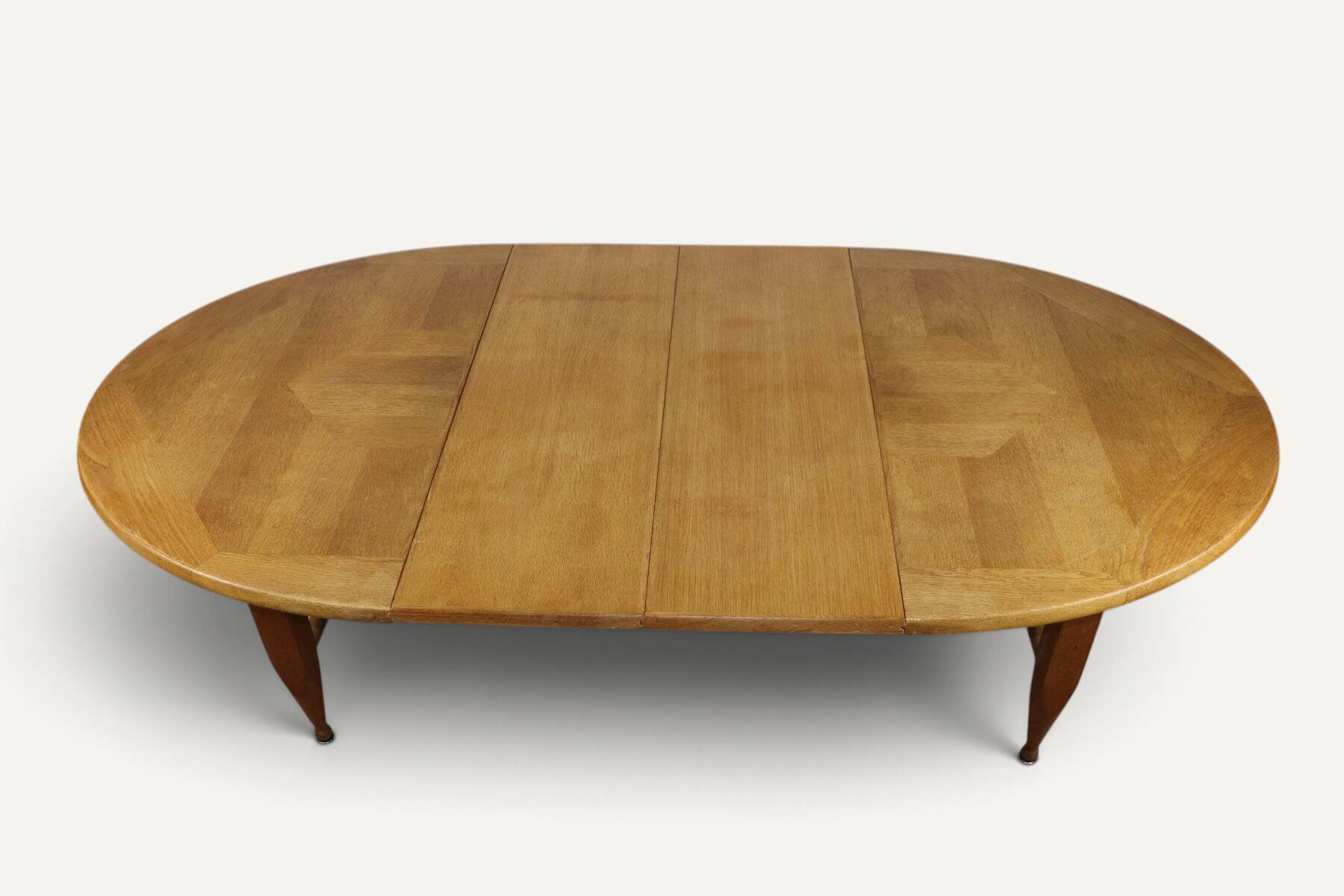 Extendable dining table in oak by Guillerme and Chambron - 1960s