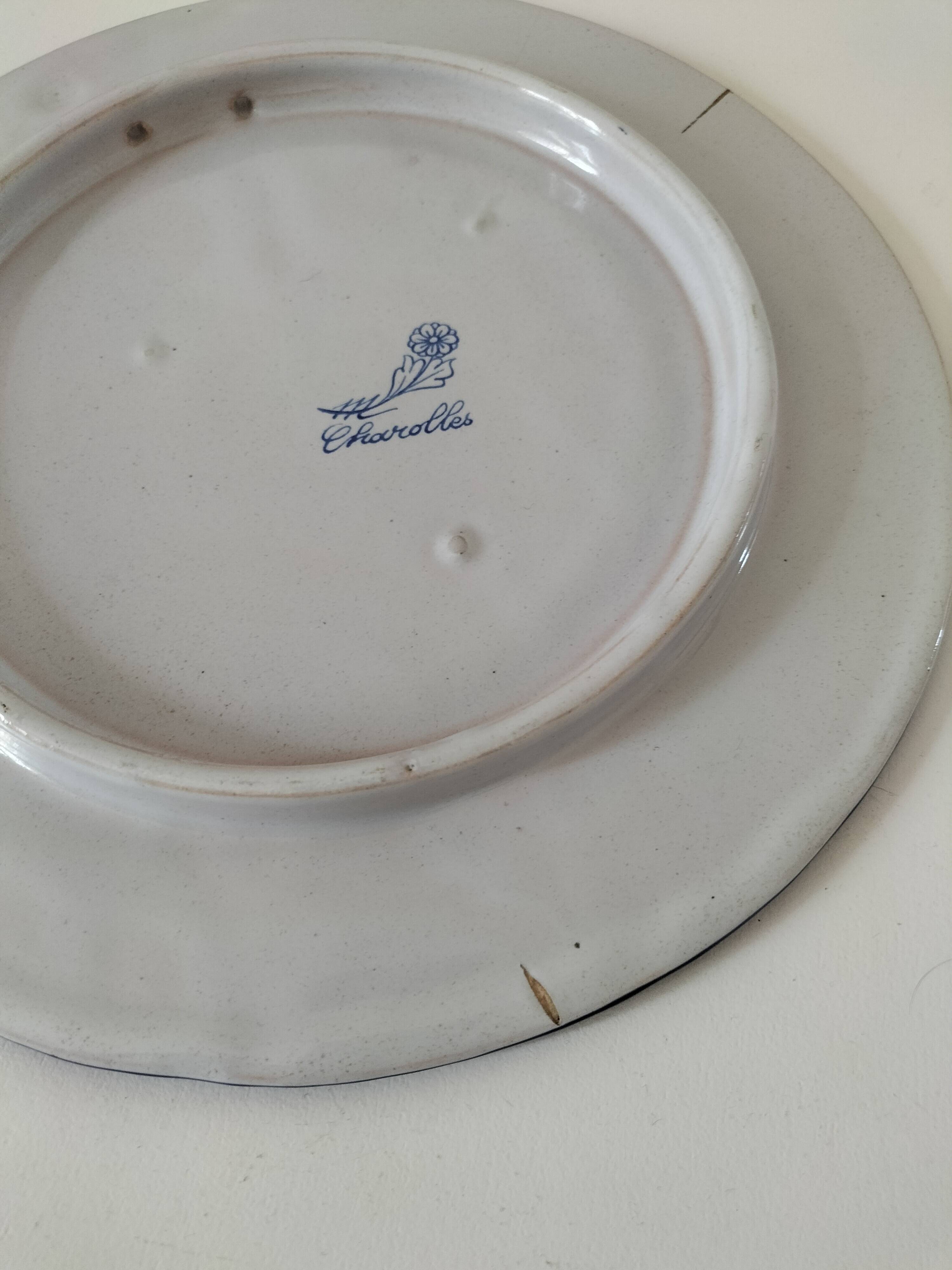 Decorative earthenware plate signed Charolles