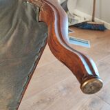 Red voltaire armchair