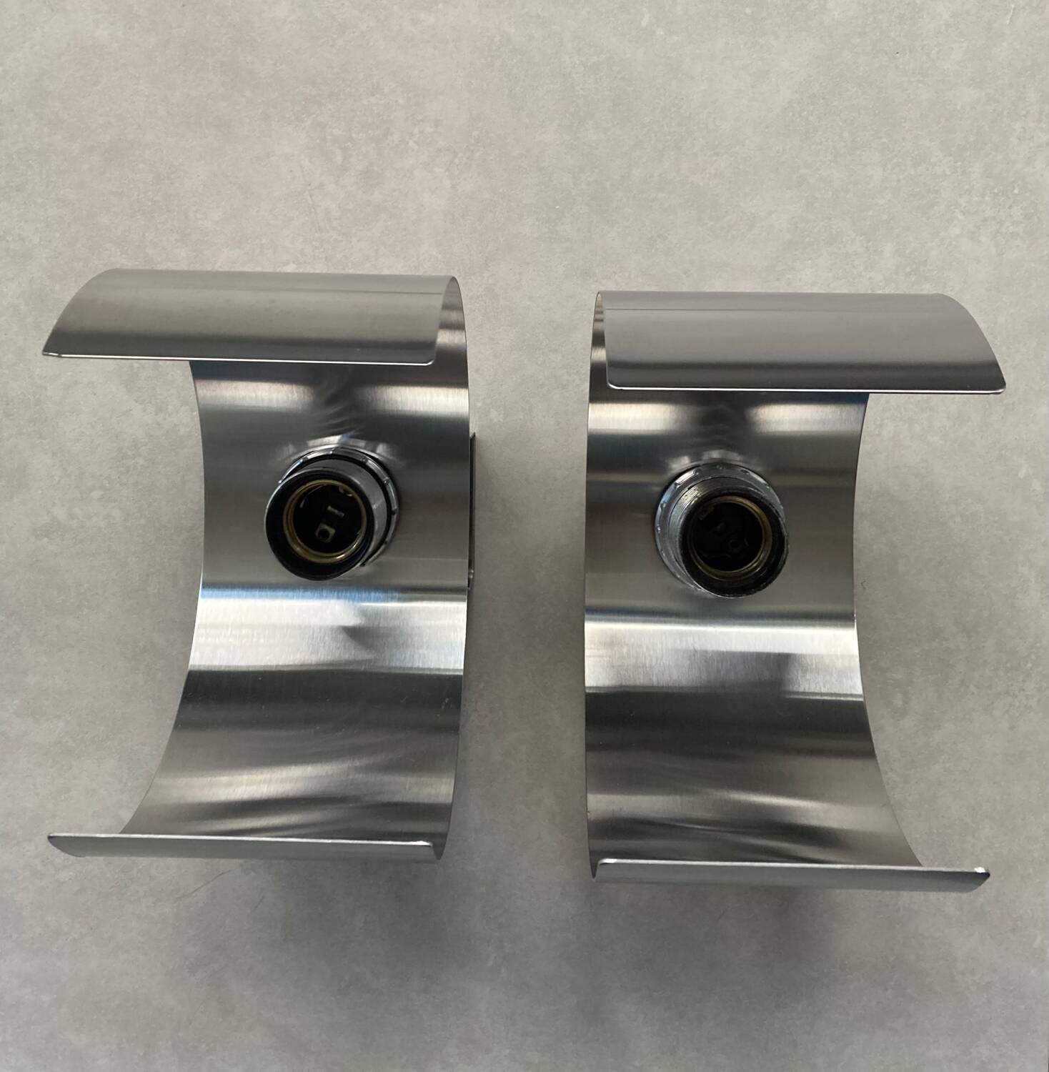 Pair of Space Age brushed metal wall lights