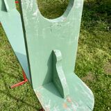 Old curved wooden farm bench