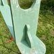 Old curved wooden farm bench