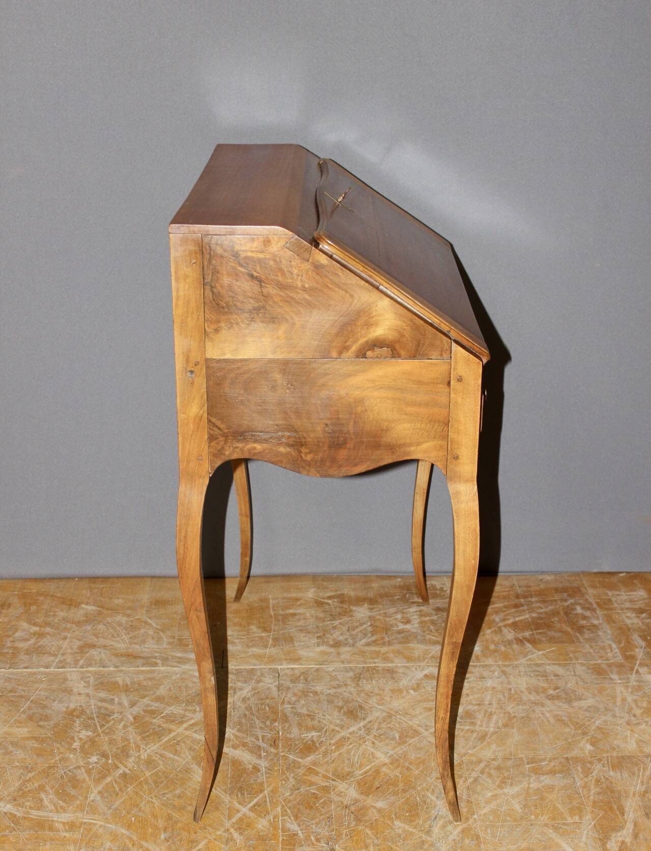 Louis XV donkey back desk in 18th century walnut