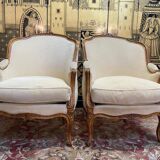Paire de fauteuils bergères gondoles de style Louis XV