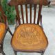 4 bentwood bistro chairs with a pattern on the seat