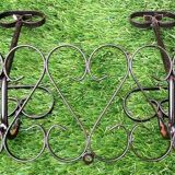 Wall coat rack two hooks wrought iron with scroll patterns 1950s