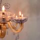 Venetian chandelier in blue and amber Murano glass, 12 light arms, circa 1980.