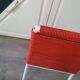 Vintage children's chair in white matel (some splinters of paint) with red scoubidou rope year 70