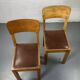 Pair of wooden and leather chairs