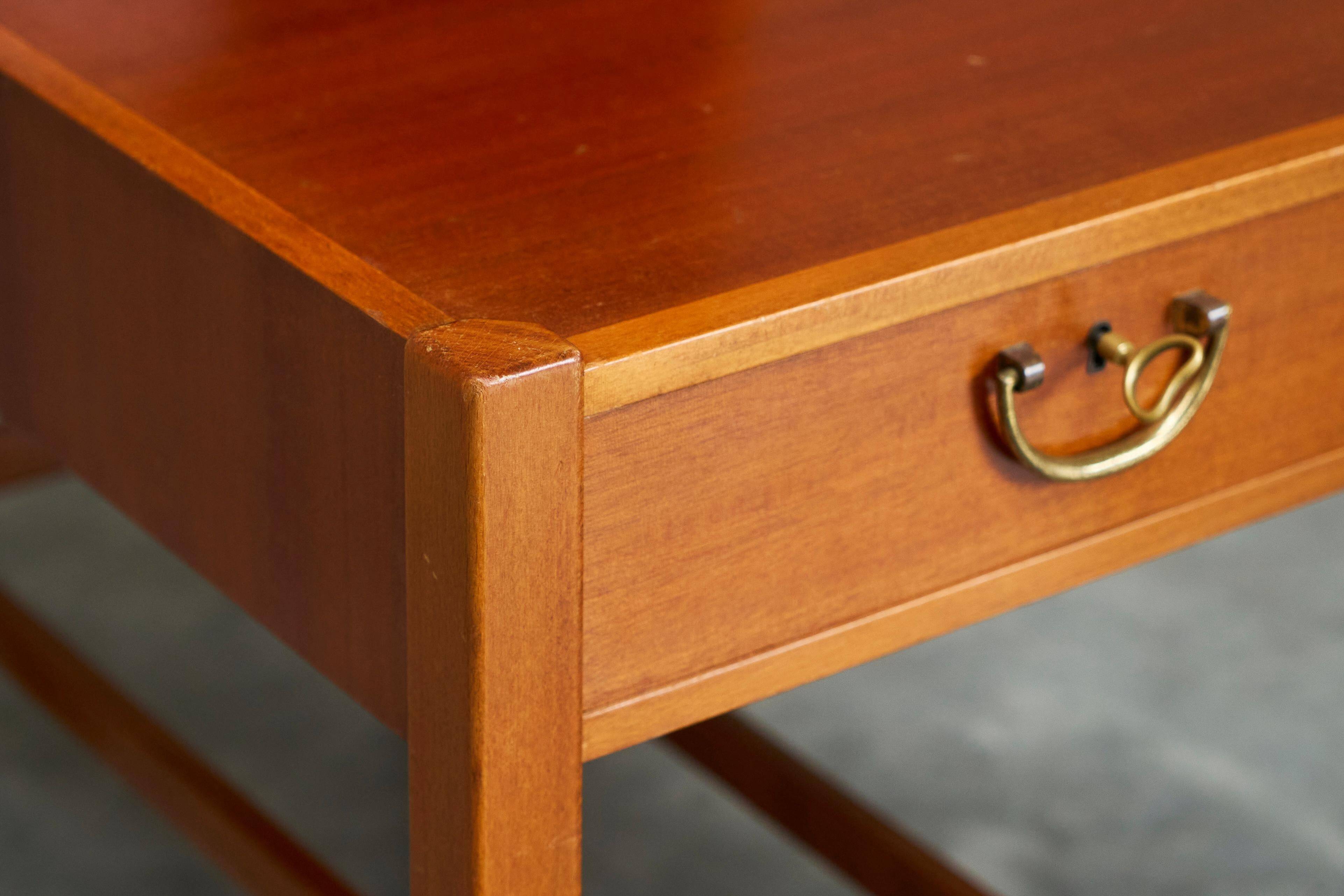 Pair of bedside tables by Nordiska Kompaniet in teak, 1952, by David Rosén.