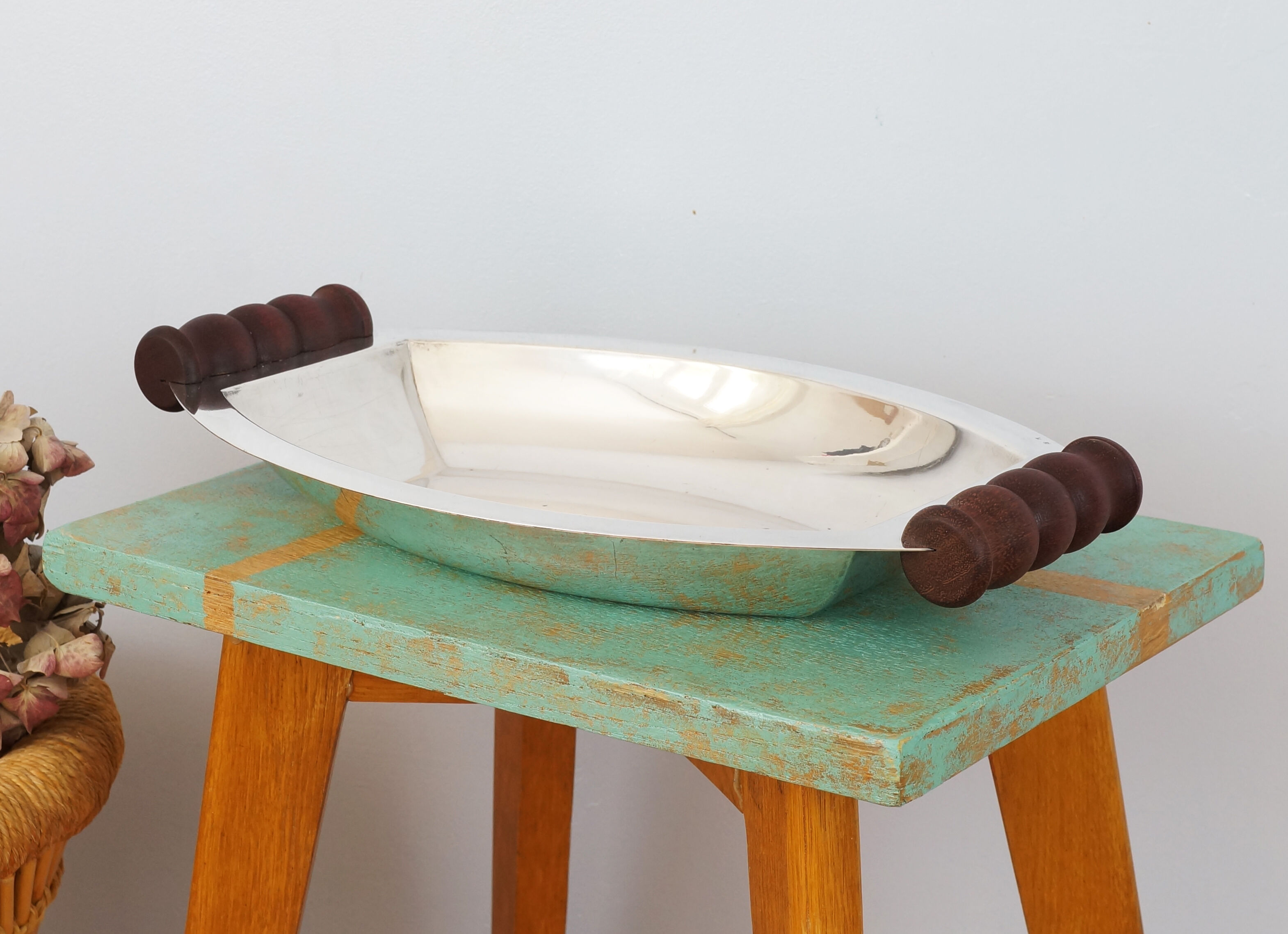 Silver plated metal hollow dish and mahogany handles