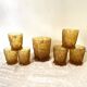 Glasses and ice bucket baroque style amber glass Italy 70s