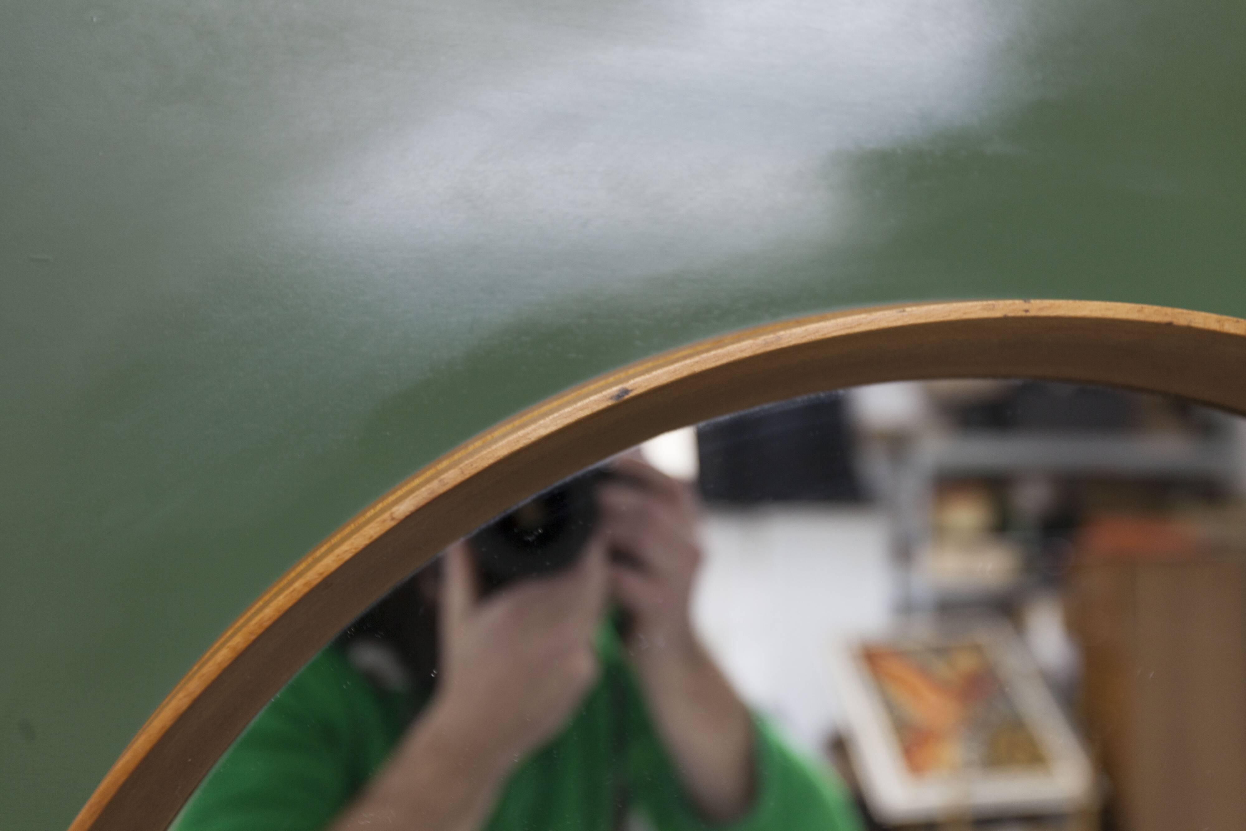Unusual round wall mirror 60 cm teak edge on green rectangular board 1960.